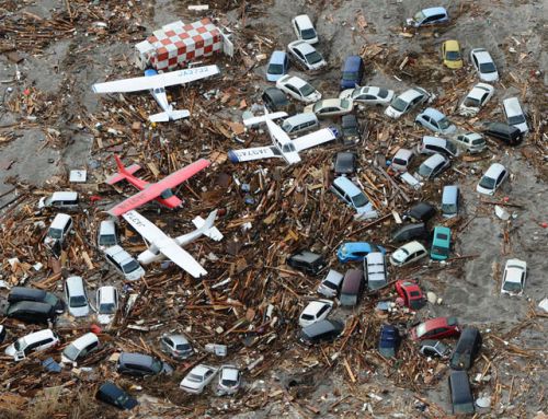 Light planes and vehicles swept by the tsunami