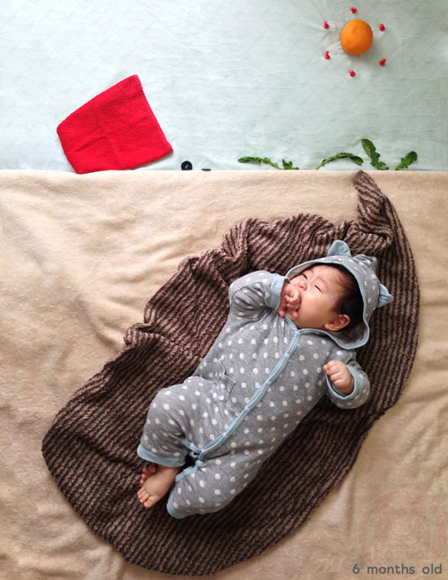 Baby sleeping-art - hibernating baby waking up (寝相アート - 冬眠から目覚め)