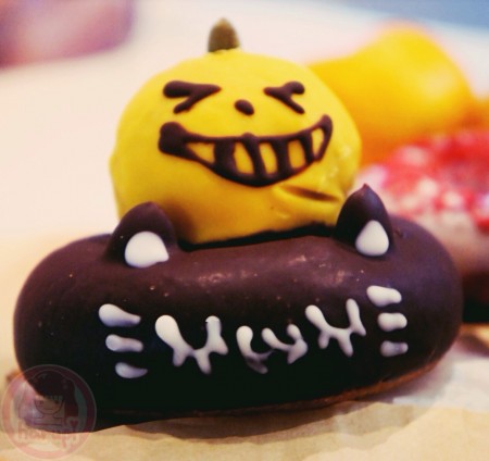 Happy Halloween black cat doughnut with pumpkin top