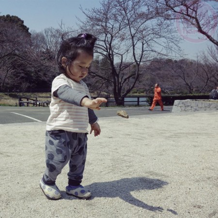 Little-big-boss throwing rock