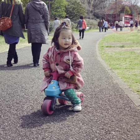 Little-big-boss riding on a bike!