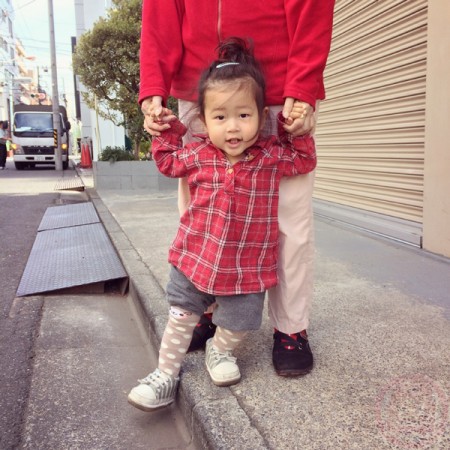 Yuto holding grandmama's hand for a walk