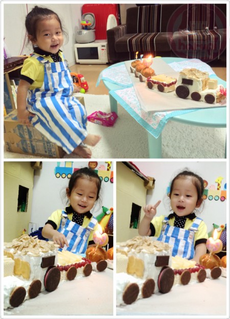 Happy having his choo choo train cake