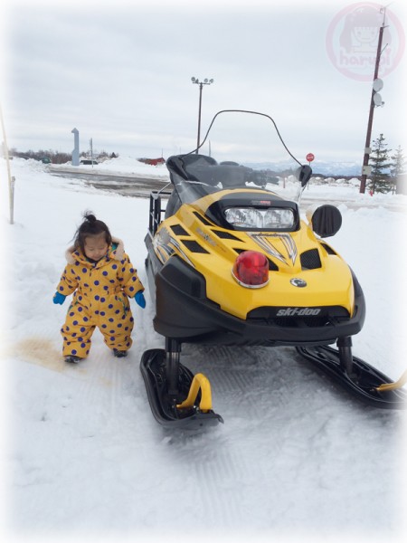 Little-big-boss and the big snowmobile