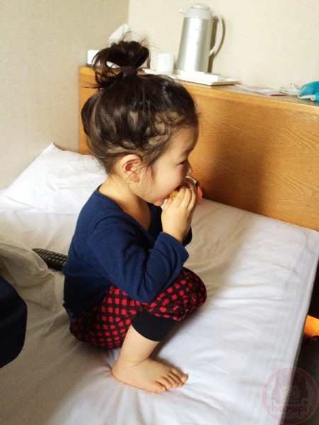 Breakfast eating bread in the hotel room