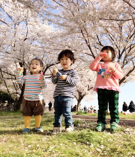 Blowing bubbles under the Sakura trees