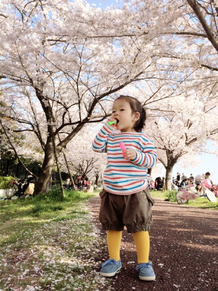 Blowing bubbles under the Sakura trees