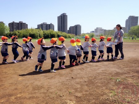 Playing at the riverbank ground.